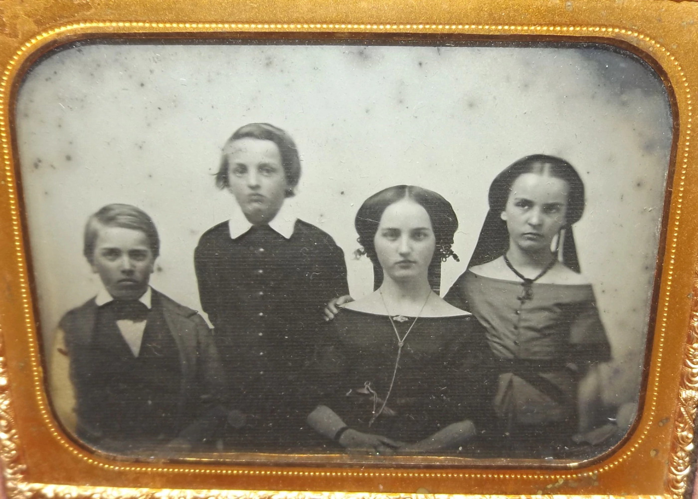 Ambrotype Photograph of Mother and Three Children in Nice Gutta Percha Case